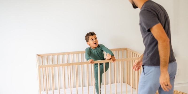 Toddler Climbing Out Of Cot