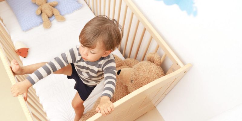 Toddler Climbing Out Of Cot