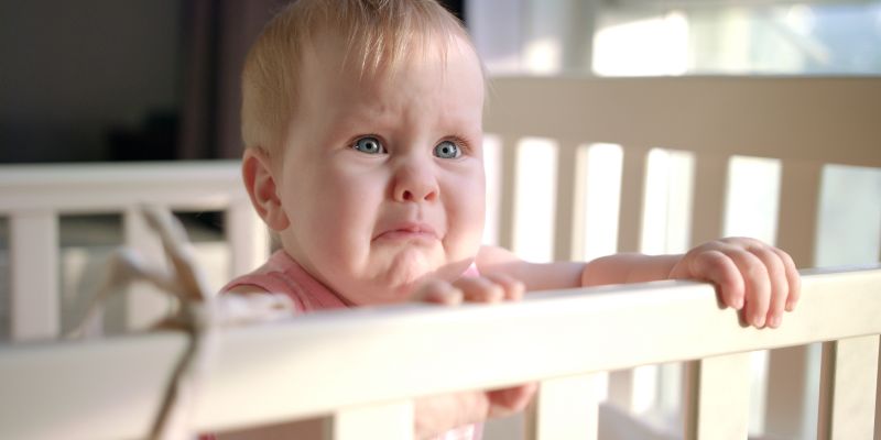 Toddler Climbing Out Of Cot