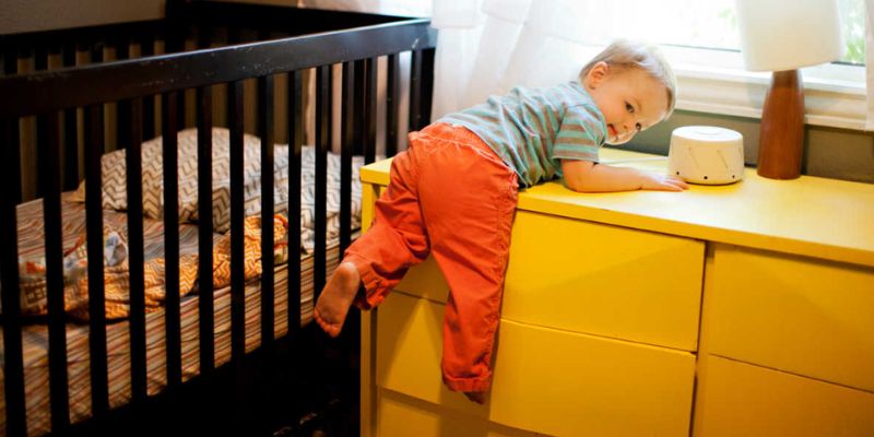 Toddler Climbing Out Of Cot