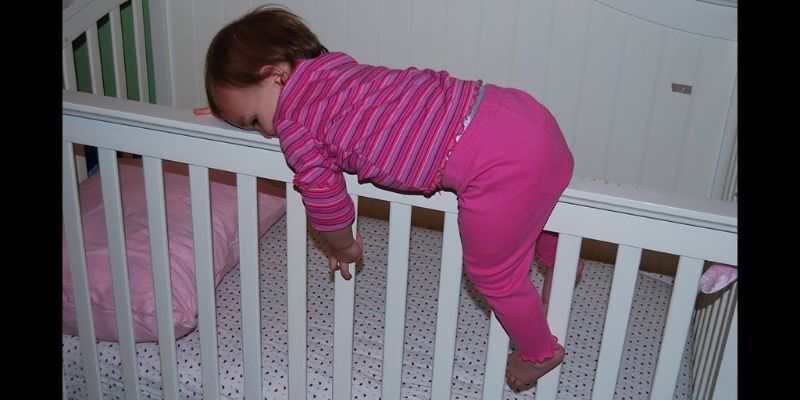 Toddler Climbing Out Of Cot