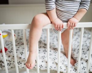 Toddler Climbing Out Of Cot